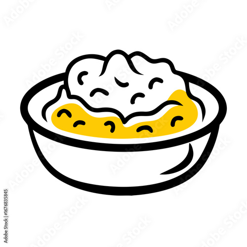 Bowl of creamy mashed potatoes with butter on top  