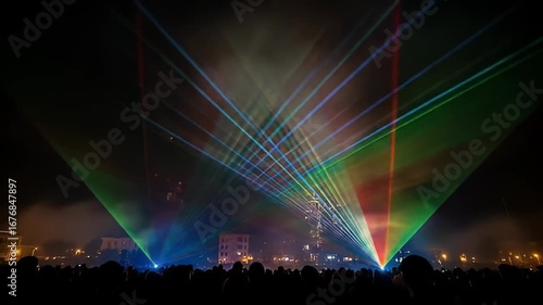 Wallpaper Mural Crowd silhouettes watch colorful laser light show at night cityscape background Torontodigital.ca