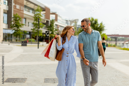 Couple smiles while shoppin...