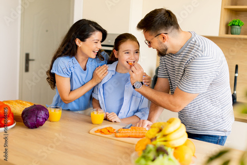Joyful family preparing hea...