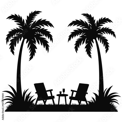 Two black deck chairs with a small table and drink under palm trees