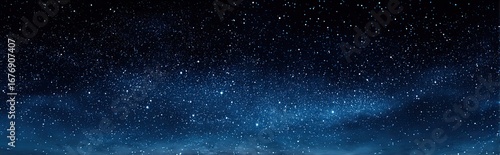 Deep night sky, densely studded with glittering stars, fading into a soft, hazy twilight at the horizon