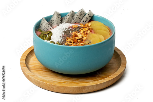The Photo of smoothie bowl taken with a high-resolution camera using the focus-stacking technique on a white background.