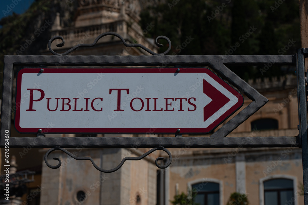 Fototapeta premium Lavatory sign in old city center