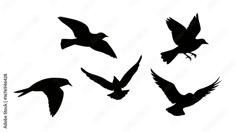 Obraz premium Flock of birds in flight and perched flying silhouette