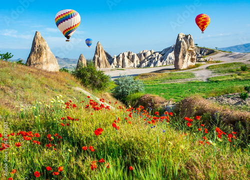 Travel concept. The great tourist attraction of Cappadocia - balloon flight. Cappadocia is one of the best places to fly with hot air balloons. Goreme, Cappadocia, Turkey.Artistic picture.Beauty world
