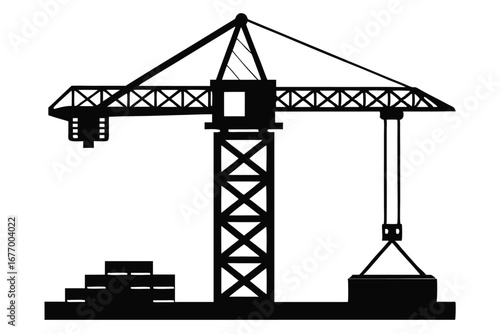 Black silhouette of a construction crane lifting materials at a construction site