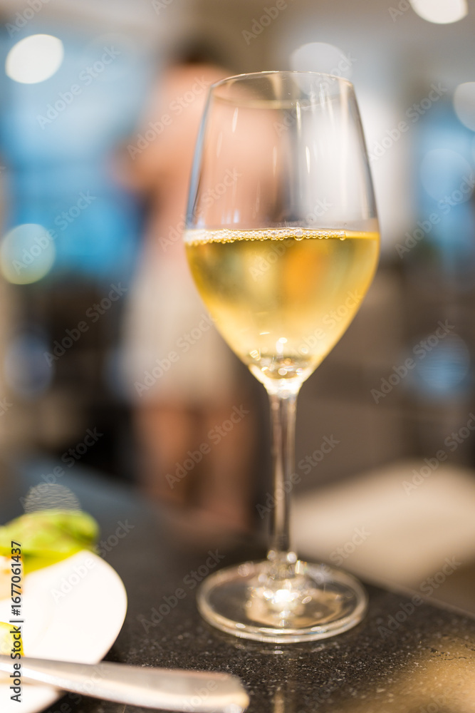 Fototapeta premium Refreshing white wine on table