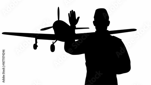 Silhouette of a man in uniform waving next to a small airplane with a propeller and landing gear