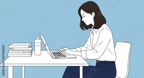 Woman working on laptop at desk with books and water bottle.  Young woman focused on her work, typing on laptop computer.  Image perfect for freelance work concept, showing woman working from home.