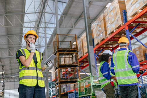 women warehouse worker, professional supervisor working control operate factory cargo loading