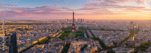 Panoramic aerial view of Paris at sunset, showcasing the Eiffel Tower and cityscapes