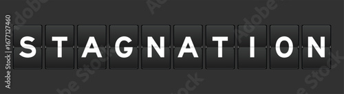 Fotografie Black color analog flip board with word stagnation on gray background