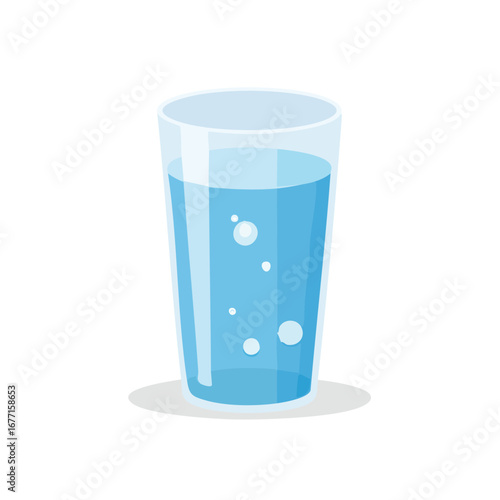 Clear glass filled with refreshing blue liquid and rising bubbles