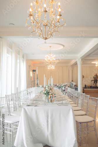 Elegant wedding dining setup in bright venue