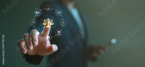 Businessman interacting with virtual justice scale and legal icons, representing business law, corporate compliance, digital legal services and legal consulting for entrepreneurs.