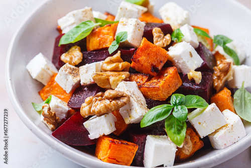 Salad with sweet potato, beetroot, feta and walnuts.