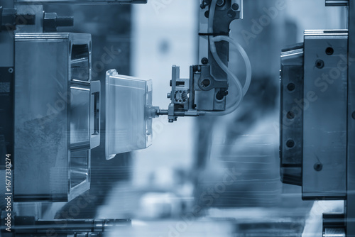 The food container production process by automatic system from plastic injection mold machine.