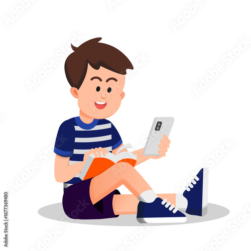 A cute boy reads a book while holding a smartphone