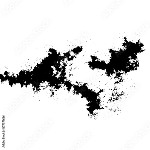 Abstract black ink blot with jagged edges and scattered specks on a white background creating a textured effect