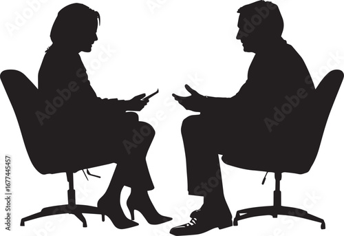 Two business people sitting, negotiating terms or shaking hands to finalize a deal.