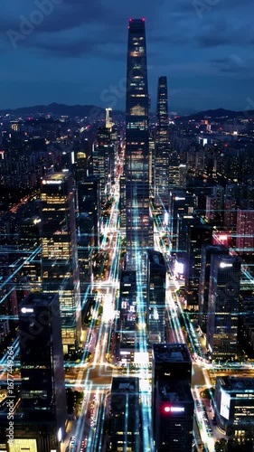 Wallpaper Mural A breathtaking hyperlapse aerial video of a vast futuristic metropolis at deep night. Towering glass and steel skyscrapers pulsate with glowing lights resembling a living motherboard. Relentless Torontodigital.ca