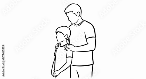 Supportive father places hand on son's shoulder with gentle affection
