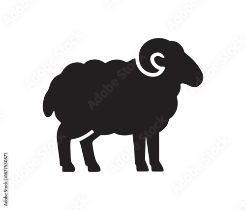 Black silhouette of a ram with curling horns standing proudly