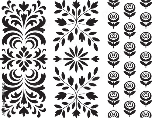 A pair of ornate black and white vector silhouettes of vintage skeleton keys with intricate decorative tops and handles.