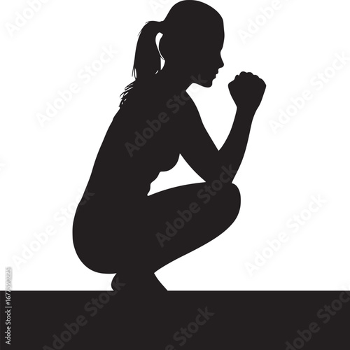 Silhouette of a woman crouching with hands clasped near her face in a contemplative pose on white