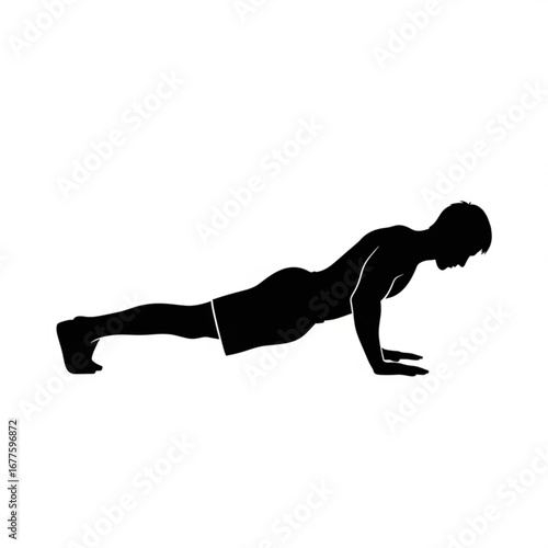 Silhouette of a man performing a push up exercise
