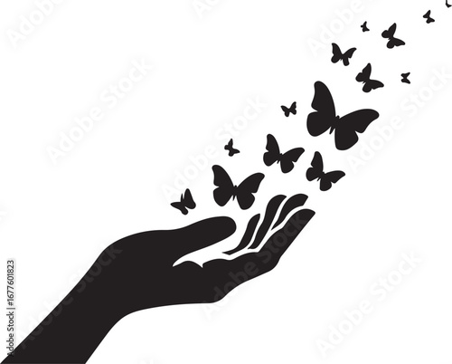 Black silhouette of a hand releasing a swarm of butterflies into the air butterfly release