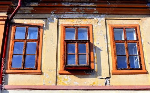 Old 19 century building with windows.