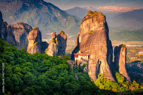 Astonishing summer view of famous Eastern Orthodox monasteries listed as a World Heritage site, built on top of rock pillars. Exciting morning scene of Kalabaka, Greece. Traveling concept background.