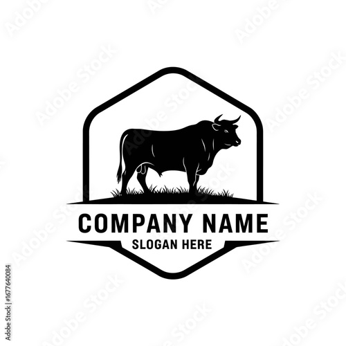 A black silhouette of a powerful bull standing in a grassy field, enclosed within a hexagonal frame with text below.