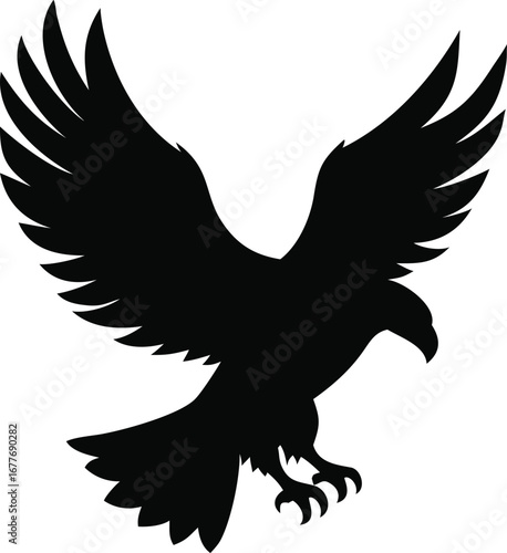 Powerful black silhouette of a majestic eagle in mid-flight with wings spread wide and talons extended silhouette