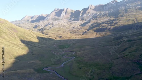 aerial drone view of sinuous river in the pyrenees mountains 