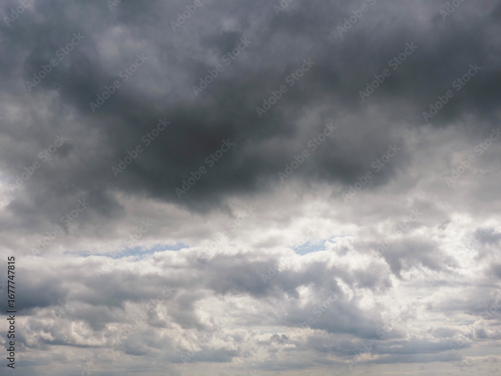 Obraz premium Blue cloudy sky. Nature background for design. Cloudscape.