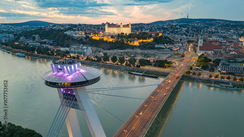 Photography Sunset view of SNP bridge and panorama of Bratislava, Slovakia