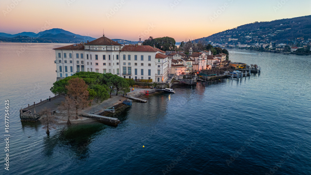 Obraz premium Sunset panorama view of Isola Bella at Lago Maggiore, Italy