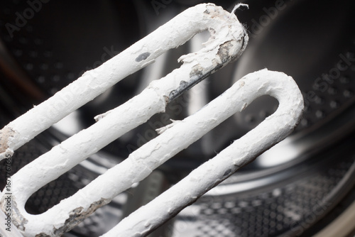 Water deposits, scale on heating element of washing machine