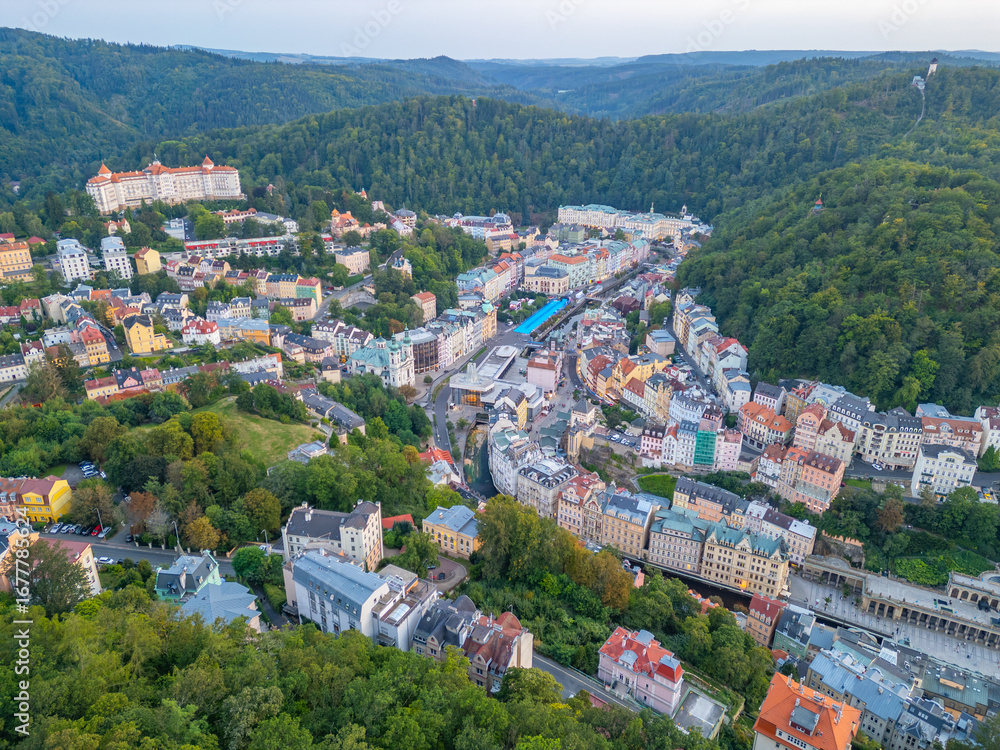Fototapeta premium Sunset panorma view of Karlovy Vary and its hotels in Czech repu