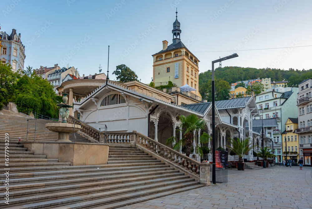 Obraz premium Sunset view of palace tower and market colonnade in Karlovy Vary