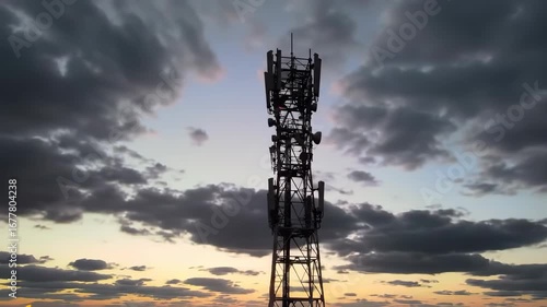 Wallpaper Mural Sunset telecommunications tower silhouette against dramatic sky Torontodigital.ca