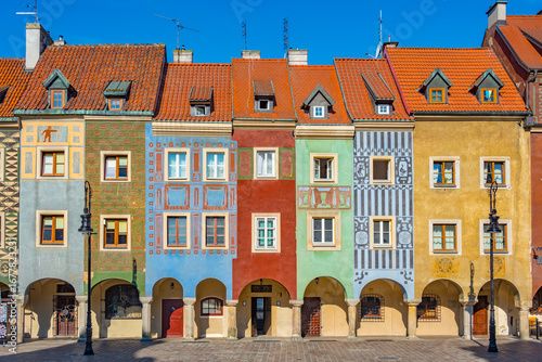 Colourful houses at Stary Rynek square in Poznan during a sunny © dudlajzov