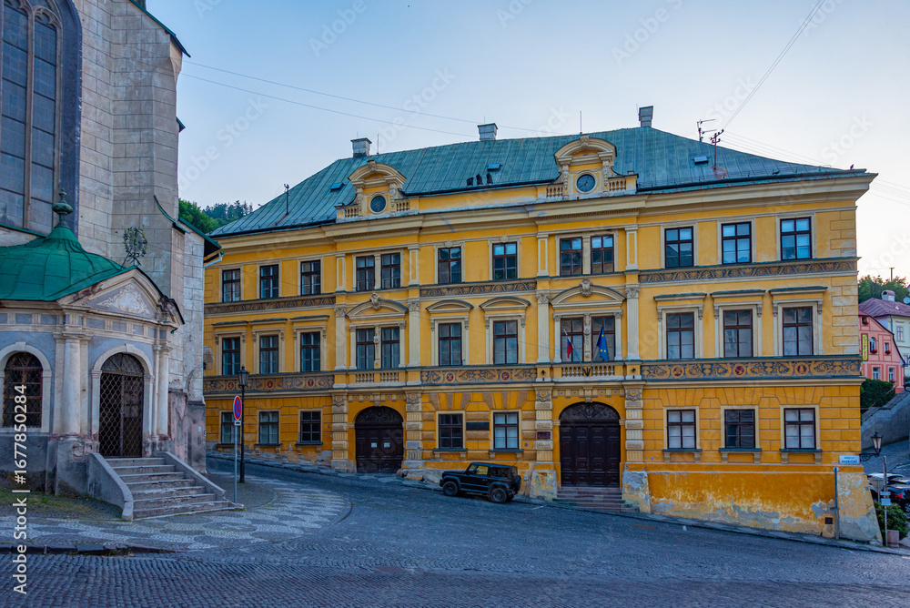 Fototapeta premium Sunrise view of a street in the old town of Banska Stiavnica, Sl