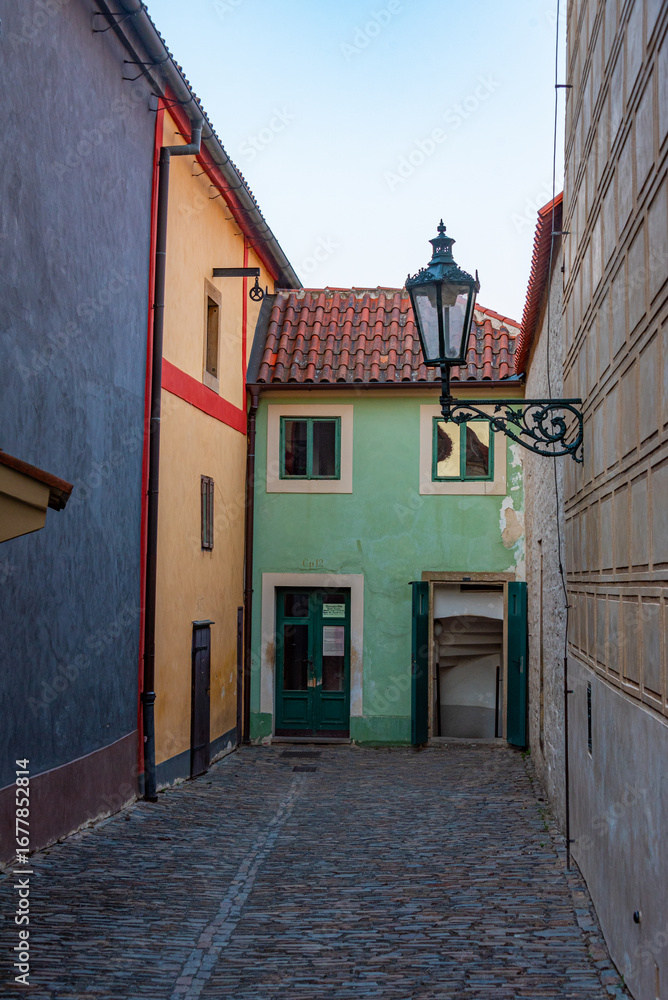 Fototapeta premium Sunset view of The golden lane at the Prague castle, Czech repub