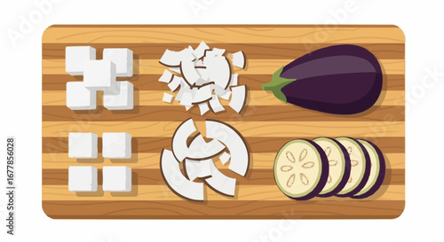 Eggplant preparation: diced, cubed, and sliced on a wooden board.