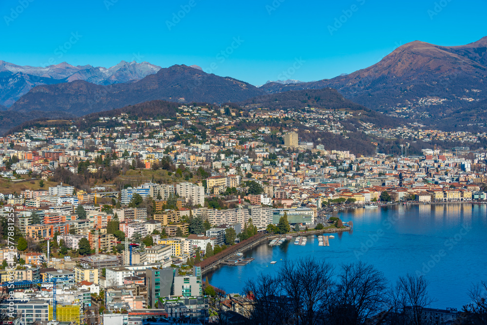 Naklejka premium Lugano in Switzerland viewed from Monte San Salvatore
