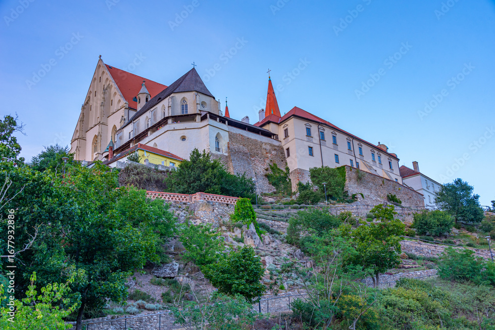 Fototapeta premium Sunset view of Saint Nicholas church and Saint Wenceslas chapel